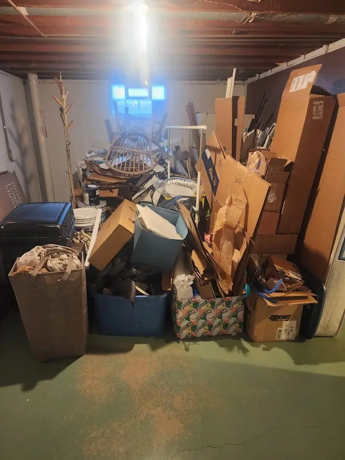 Roll-off dumpster container at job site for 2 Yard Dumpster Rental in Wendell